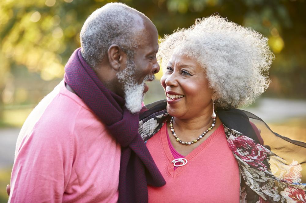 A smiling couple in the park